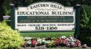 Eastern Hills Educational Building logo