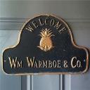William Warmboe & Co. Antiques logo