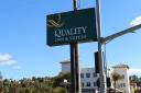  Quality Inn & Suites Oceanside logo