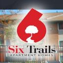 Six Trails Apartment Homes logo
