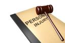 Injury Settlement Attorney logo