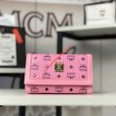 MCM Medium Gold Visetos Trifold Wallet In Pink logo