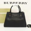 Burberry Medium Leather Top Handle Bag In Black logo