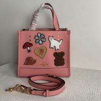 Coach Dempsey Tote 22 in Pebble Leather Creature p image 1