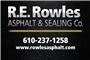 R E Rowles Asphalt Sealing Co logo