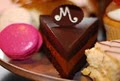 Madeleine's Cafe & Patisserie logo