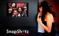 SnapShotz Photobooth Rentals logo