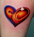 Art in Motion Tattoos and Piercing image 5
