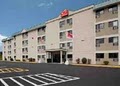 Econo Lodge  Inn & Suites logo