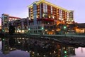 Hampton Inn & Suites Greenville Hotel Downtown RiverPlace logo