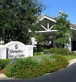Hampton Inn & Suites Wilmington Landfall / Wrightsville Beach logo