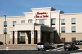 Hampton Inn & Suites logo