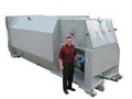 Komar Industries Inc. - Shredders & Waste Compactors That Shred! image 4
