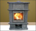 M. Teixeira Soapstone Wood Stove logo