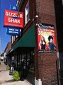 Sizzor Shak Salon and Color Spa logo