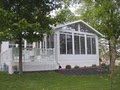 Sunrooms By Team / Team Windows and Siding logo