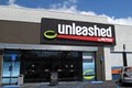 Unleashed by Petco logo
