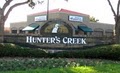 America's Urgent Care of Hunter's Creek logo