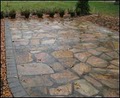 Custom Cuts Landscape & Stone logo