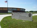 Fort Hays State University: Kansas Wetlands Education Center logo