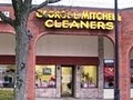 George E. Mitchell Cleaners logo