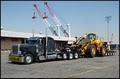 J & J Specialized Trucking, Rigging & Hauling logo