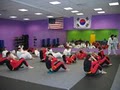 Jhoon Rhee Black Belt Academy (Tae Kwon Do Karate) logo