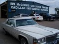 McGinnis Cadillac-Mitsubishi-Hummer Body Shop logo