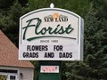NewLand Florist logo