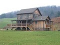 Old Log Cabins logo