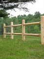 Whitney Rustic Fence logo