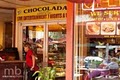 Chocolada Bakery & Cafe logo