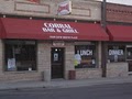 Corral Bar & Grill logo