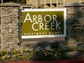 Arbor Creek Apartment Homes logo