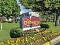 Chimneys of Greenville Apartments logo