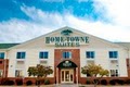 Home-Towne Suites logo
