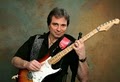 Music Teacher Guitar Lessons Darryl hill logo