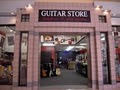 Naked Daves Guitar Store and Rock & Roll Apparel logo