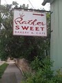 Rather Sweet Bakery & Cafe logo