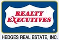 Realty Executives - Hedges Real Estate logo