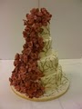 SARAJPASTRIES AND CAKES logo