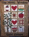 The Attic Window Quilt Shoppe logo