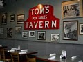 Toms Restaurant and Tavern logo