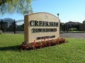 Creekside Luxury Homes logo