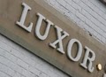 Luxor Salon logo