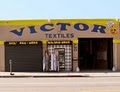 Victor Textiles logo