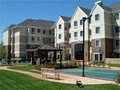 Staybridge Suites Extended Stay Hotel Tulsa-Woodland Hills logo