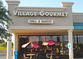 The Village Gourmet logo