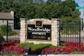 Woodbridge Apartments logo