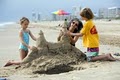 sandy feet's sandcastle lessons logo